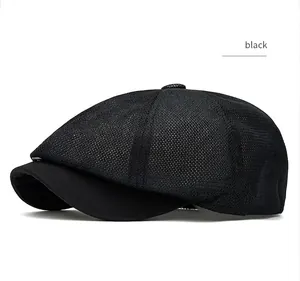 Side profile of a black mesh newsboy cap highlighting its breathable fabric texture