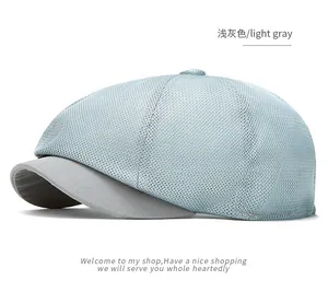 Macro view of light gray breathable mesh newsboy cap for summer sun protection