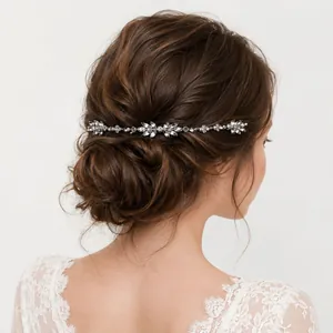 Elegant silver rhinestone vine hair comb accessory for bridal wedding hairstyles on model