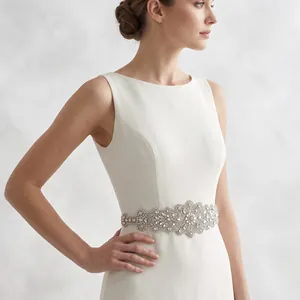 Luxurious bridal belt featuring intricate crystal flower embellishments for weddings
