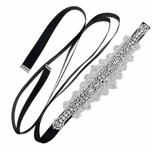 Elegant bridal rhinestone sash with black satin ribbon and crystal floral applique.