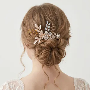 Exquisite floral and leaf bridal hair comb accessory styled on a textured hair bun