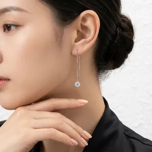Elegant S925 silver ear thread featuring a 2-carat moissanite stone on an Asian model