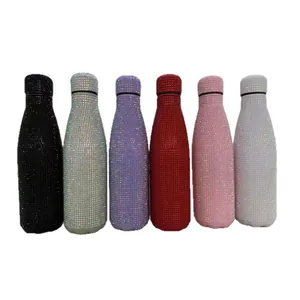 Collection of rhinestone-studded stainless steel insulated water bottles in various colors