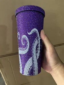 Purple rhinestone-encrusted tumbler featuring a detailed white octopus tentacle