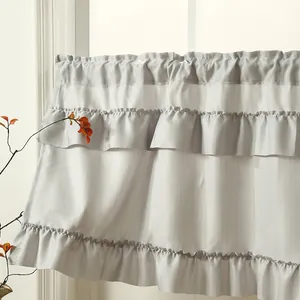 Detailed macro view showing the tiered ruffled edges of this elegant gray cake skirt curtain