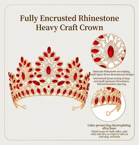 Detail view of Baroque vintage crown with red rhinestones and gold alloy base