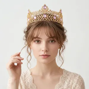 Elegant gold wedding crown with pink crystals and rhinestones for bridal pageant and party