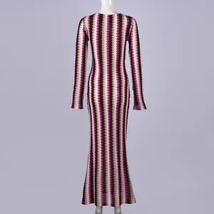 Detailed back view of a slim-fit long-sleeve maxi dress with colorful zigzag stripe pattern.