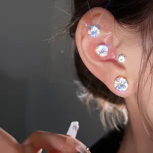 Detailed close-up showing 925 sterling silver stud earrings with shiny zircon stones