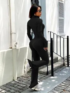 Slim fit black Y2K yoga sports set featuring tight long sleeve jacket and flared trousers