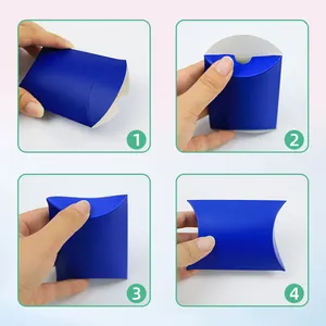 Step-by-step visual tutorial for folding a small blue pillow-shaped gift box for candy