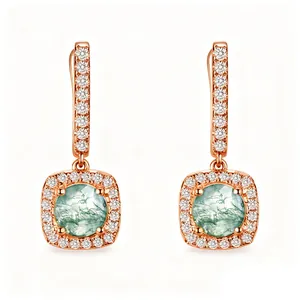 Boucles d'oreilles pendantes en or rose avec agate mousse verte et halo en zircone.