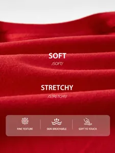 Détail en gros plan du tissu en pur coton rouge doux et respirant pour vêtements de nouveau-né.