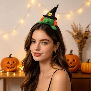 Woman wearing a cute Halloween green witch plush headband in a festive pumpkin setting