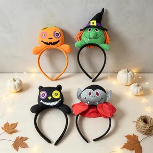 Detail of Halloween headbands featuring pumpkin, witch, black cat, and vampire designs
