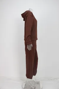 Side view of brown hooded sweatshirt and matching sweatpants leisure sports set