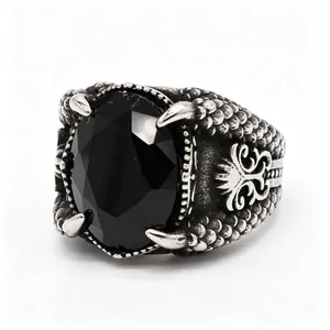 Vintage dragon claw ring with large black faceted stone in silver-toned finish