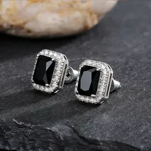Detailed view of elegant square stud earrings with black center stone and silver finish