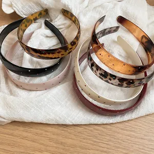 Group of vintage acrylic headbands with colorful rhinestones in multiple patterns and colors
