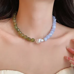 Detail of dopamine-style acrylic beaded necklace with a central baroque pearl