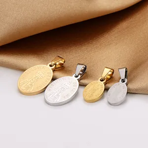 Macro view of 18k gold plated stainless steel oval portrait pendants in gold and silver