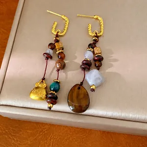 Vintage ethnic style beaded dangle earrings featuring resin teardrop and fortune bag