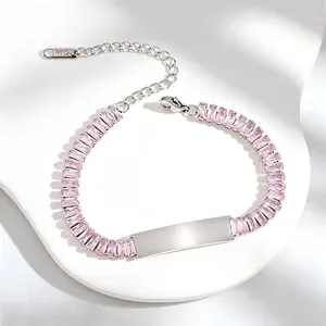 Detailed shot of pink zircon stainless steel bracelet with engravable blank plate