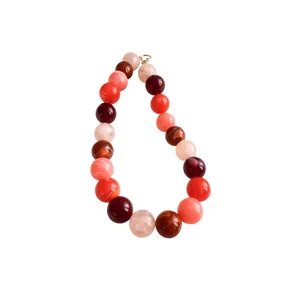 Colorful acrylic chunky bead necklace in shades of red and pink for fashion
