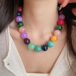 Detailed close-up of a colorful acrylic beaded necklace in vibrant dopamine colors