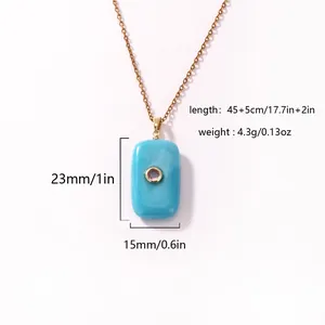 Detailed view of blue resin rectangle necklace with gold chain and dimensions
