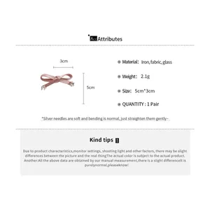 Detail van de roze strik haarclip met volledige afmetingen en materiaalspecificaties