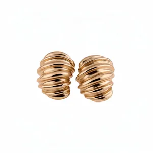 Vintage gold ribbed croissant stud earrings with a geometric textured design for women.