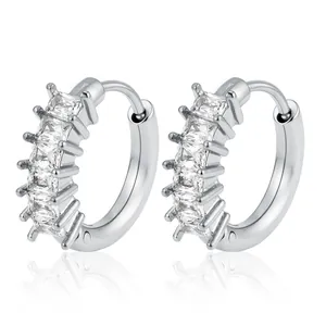 Detailed macro view of square cubic zirconia silver stainless steel hoop earrings