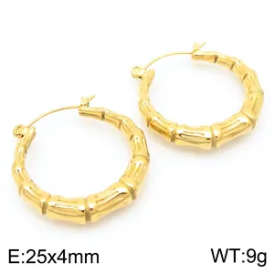 Close-up of gold-plated bamboo joint hoop earrings showing 25x4mm size and 9g weight