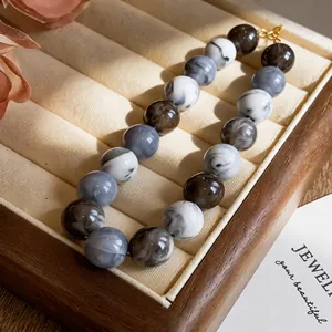 Acrylic marble patterned round beaded necklace in black and grey for beach vacation