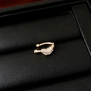 Elegant gold wing-shaped ear cuff with sparkling zircons for non-pierced ears