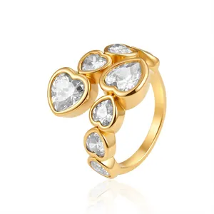 Detail showing macro view of 18K gold plated open ring with heart-shaped crystals