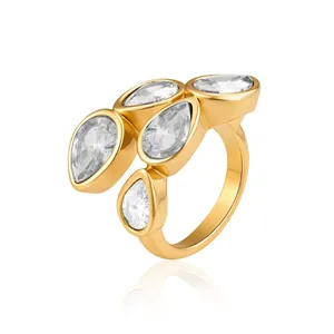 Detailed view of the electroplated 18K gold ring with teardrop-shaped clear stones