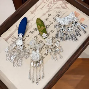Vintage silver flower tassel hair clips with butterfly design for Hanfu and ethnic style.