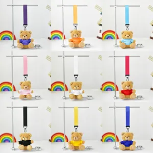 Colección de 9 coloridos llaveros de peluche de osito con correas y camisetas a juego