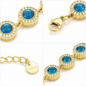 Gros plan d'un collier tennis doré avec pierres bleues et halo de cristaux transparents.