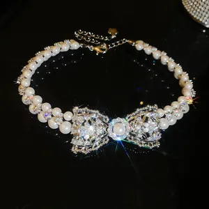 Collana di perle vintage stile francese con fiocco in zirconi scintillanti
