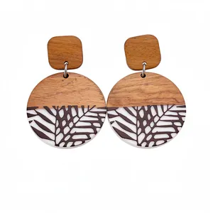 Boho chic resin wood round drop earrings with tropical leaf cutout print design