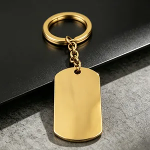 Detailed view of a mirror-polished gold stainless steel blank military dog tag keychain.