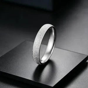 Detail view of silver frosted starry sky titanium steel ring with sparkling texture finish