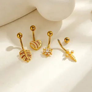 Set of four gold-plated copper zirconia belly button rings in heart, leaf, and cross designs