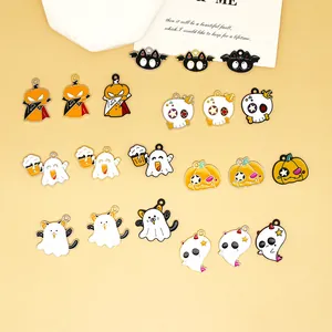 Detailed view of assorted Halloween enamel charms with ghost and pumpkin motifs