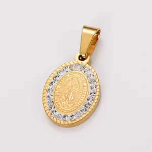 Macro view of gold stainless steel Virgin Mary Guadalupe pendant with rhinestones