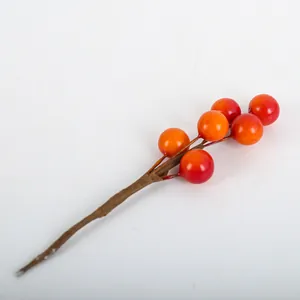 Artificial red berry sprig for Christmas DIY flower arrangements and holiday decor.